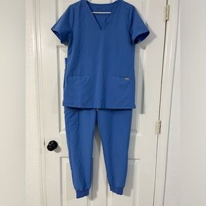 Figs Scrubs 
Top- Size S
Bottoms - Size M